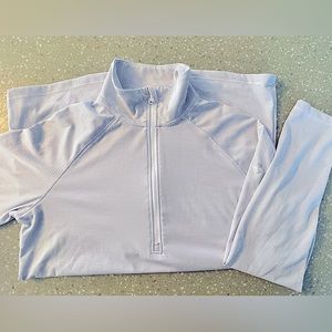 Under Armour 1/4 zip long sleeve heat gear shirt.